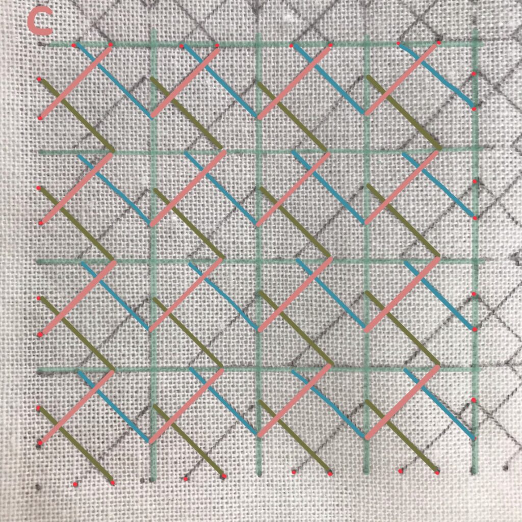 左上の斜め線をもも色に色付けした写真