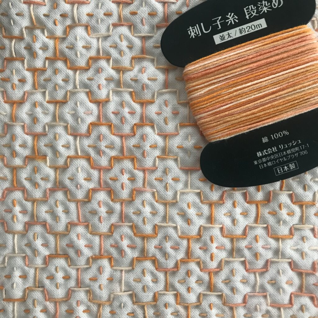 橙段染めで刺した写真