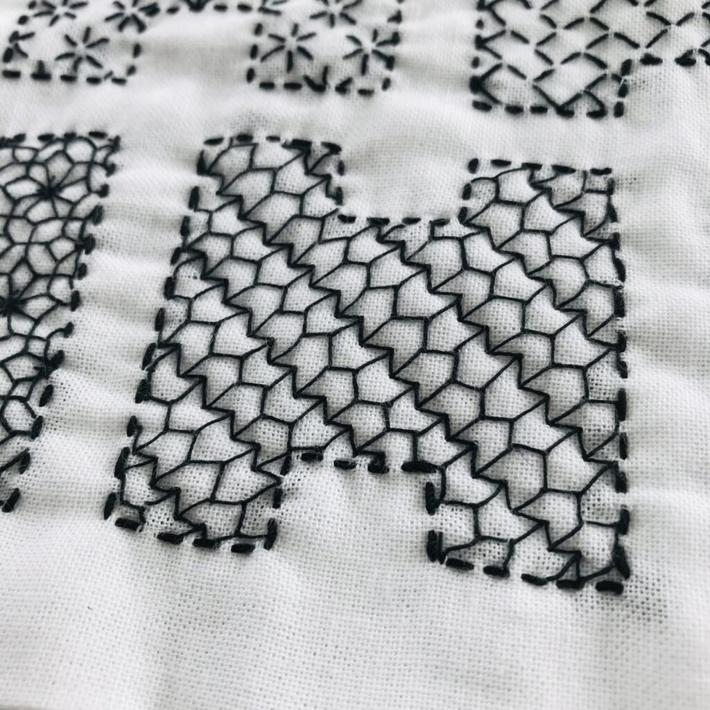 エイチに矢羽根を刺した画像