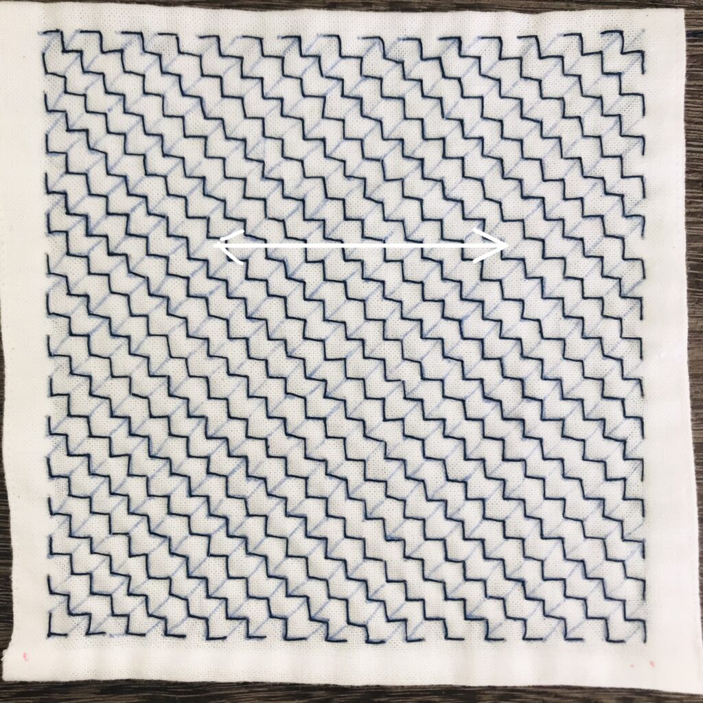 矢羽根の横を刺した写真