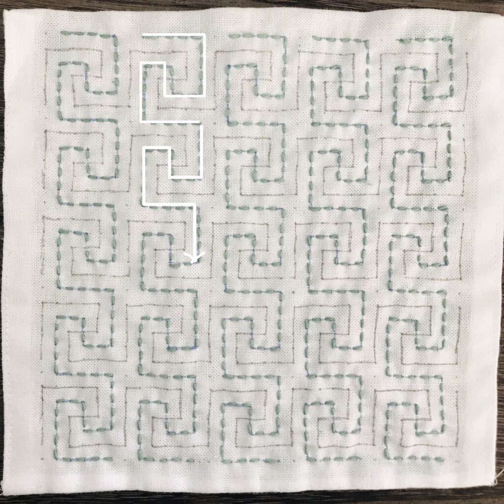 たて方向を刺したうず万字刺し子の画像